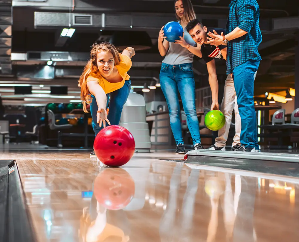 friends bowling at a bowling center in Bronson MI